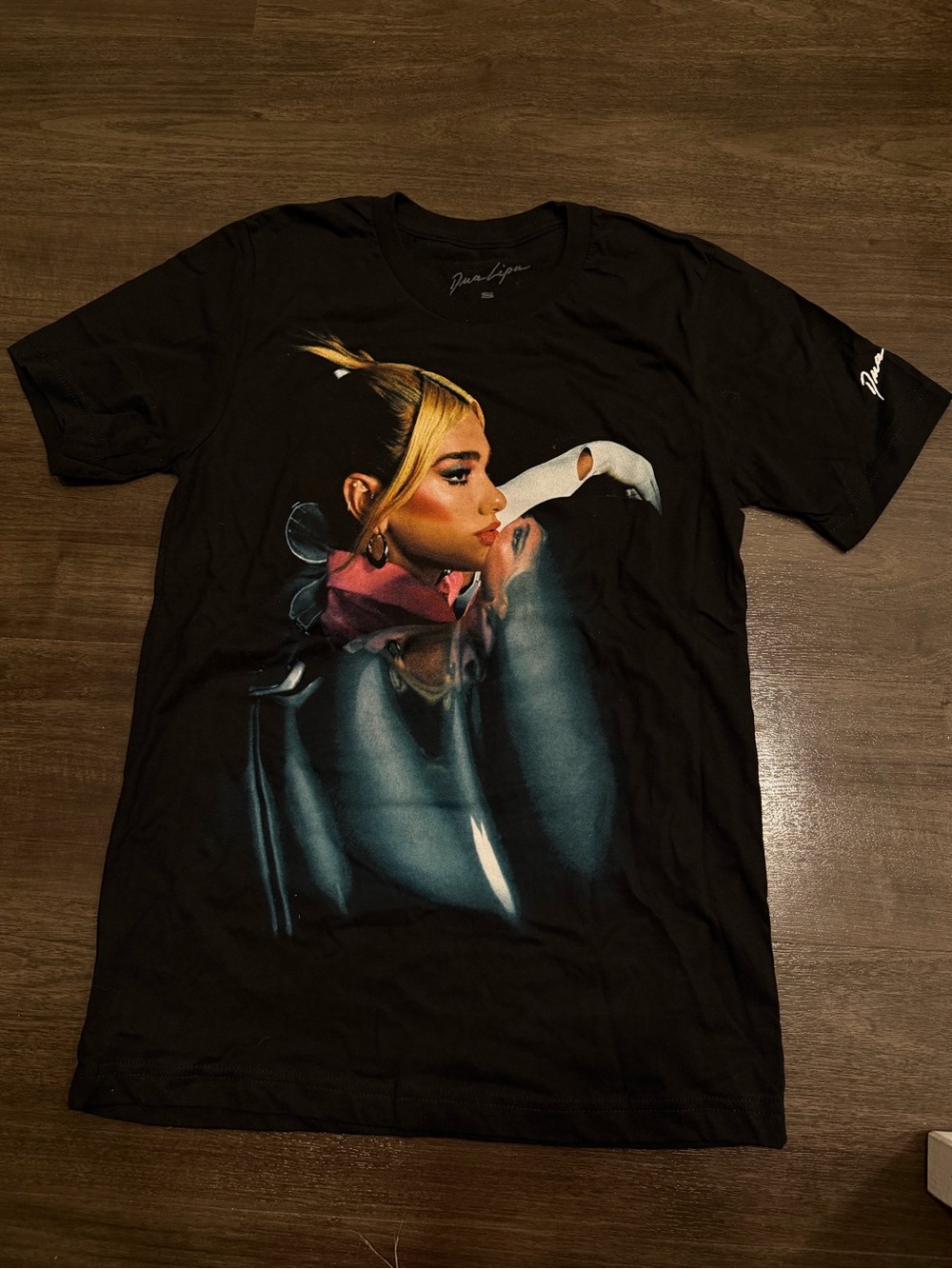 Genuine Merchandise Black Tee with Multicolor Portrait Print